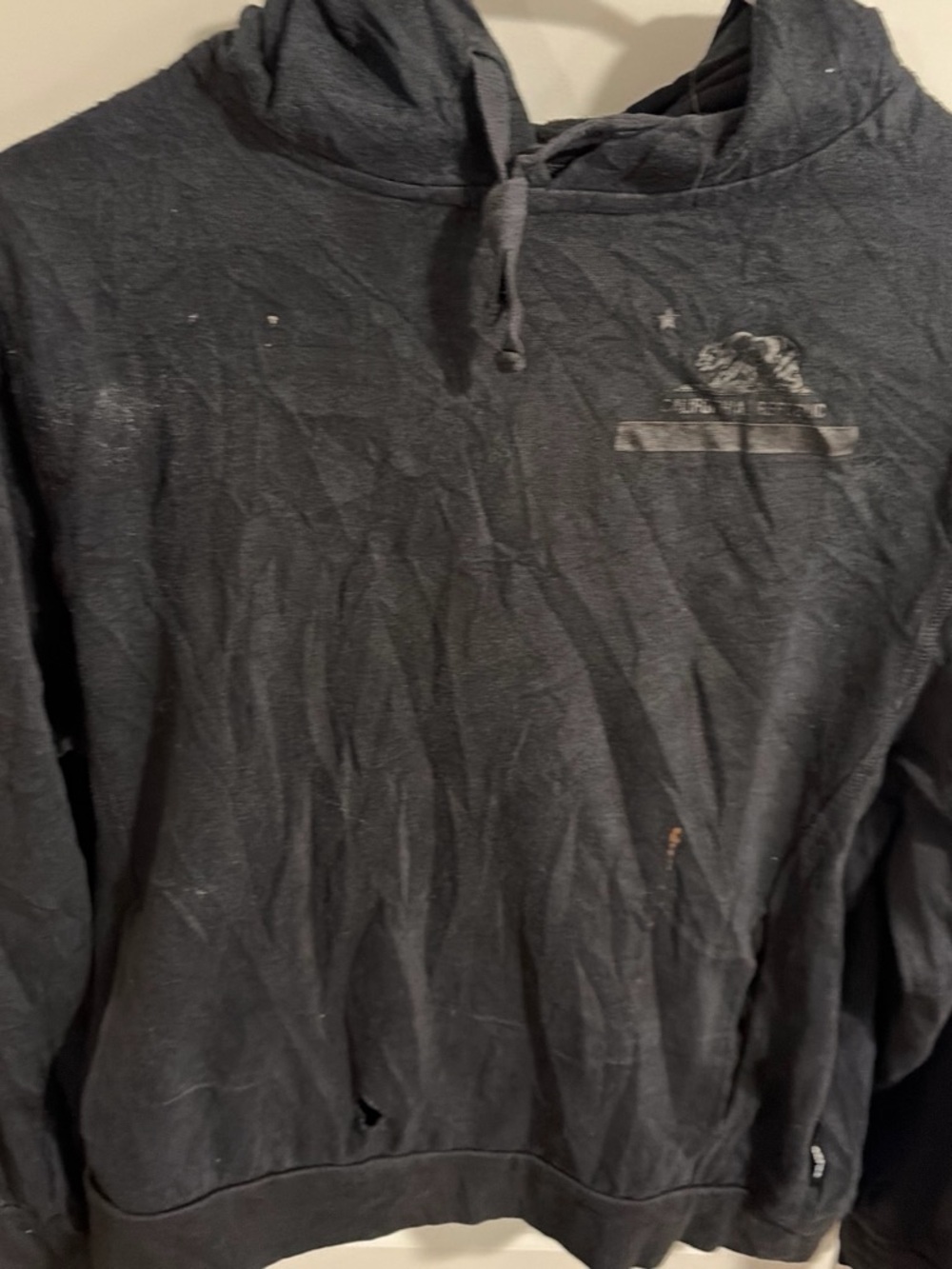 Black Pullover Hoodie with Subtle Chest Graphic - Unbranded